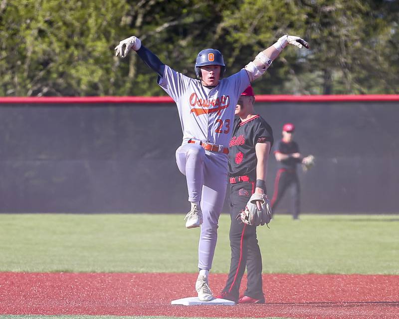 Oswego's Conor Tully (23) celebrates after pulling up to second for a double during baseball game between Oswego at Yorkville. Thursday, May 8, 2025 in Yorkville.