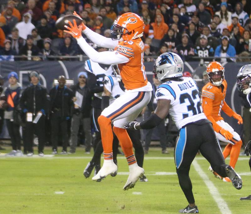 Chicago Bears wide receiver Tyler Scott makes a catch over Carolina Panthers corner back Dicaprio Bootle on Thursday, Nov. 9, 2023 at Soldier Field.
