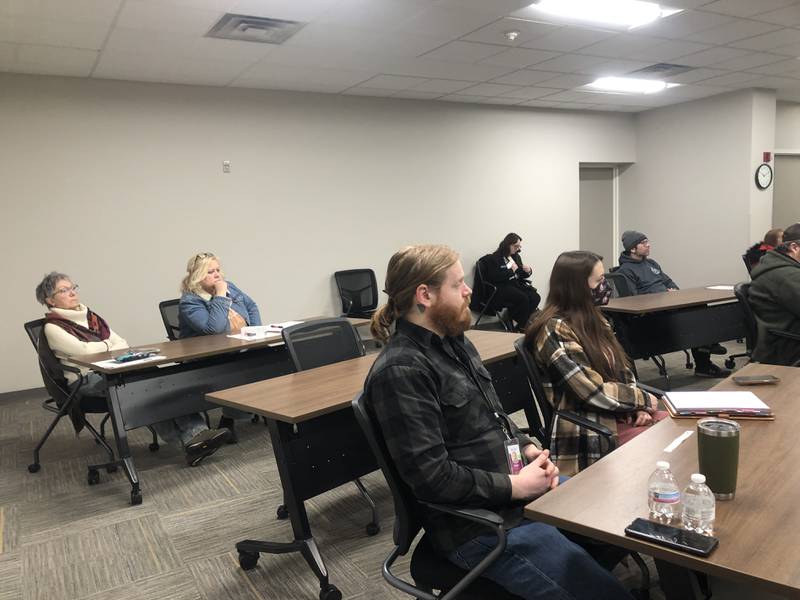 Attendees listen at a opioid abuse town hall hosted by Congressman Bill Foster, D- Naperville, March 23, 2024.