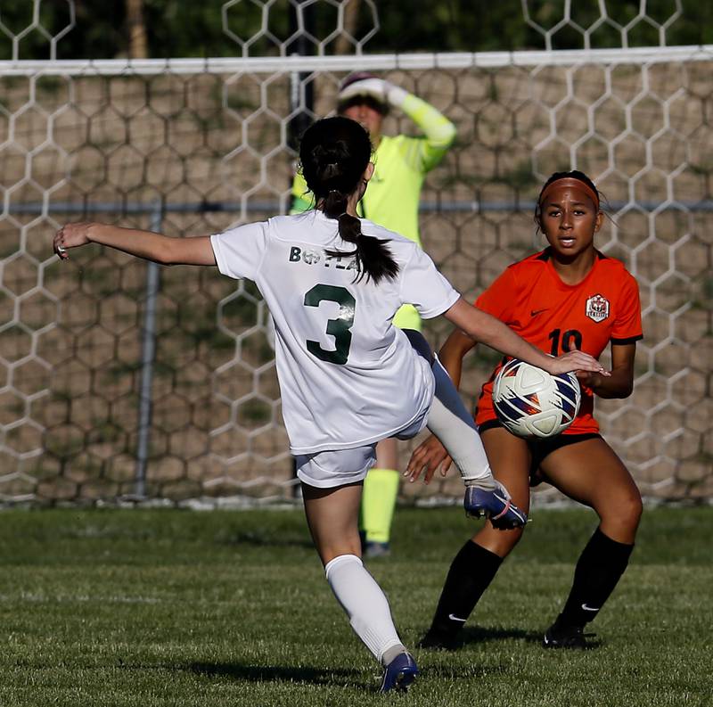 Boylan's Joscelyn Posada takes a shot on goal as she is defended by Crystal Lake Central's Chelsea Iles during the IHSA Class 2A Burlington Central Girls Soccer Sectional final match Friday, May 26, 2023, at Burlington Central High School.