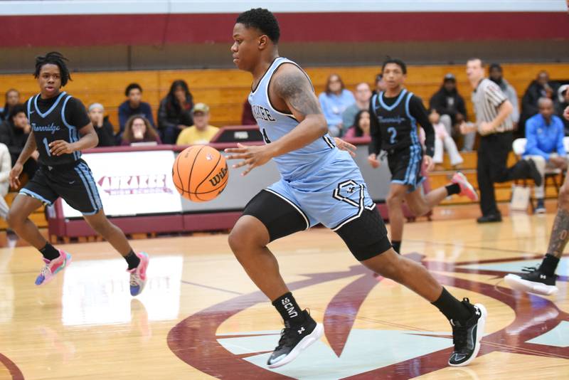 Kankakee's Myair Thompson drives down the court during a home game against Thornridge Friday, Dec. 5, 2025.