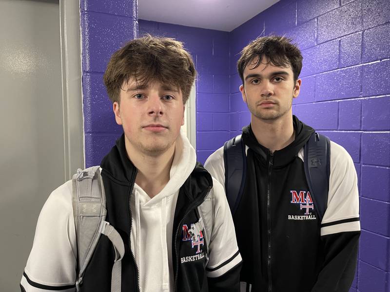 Marmion seniors Collin Wainscott and Henry Dallman following their 72-69 victory over Kaneland in Thursday's Plano Christmas Classic semifinal.