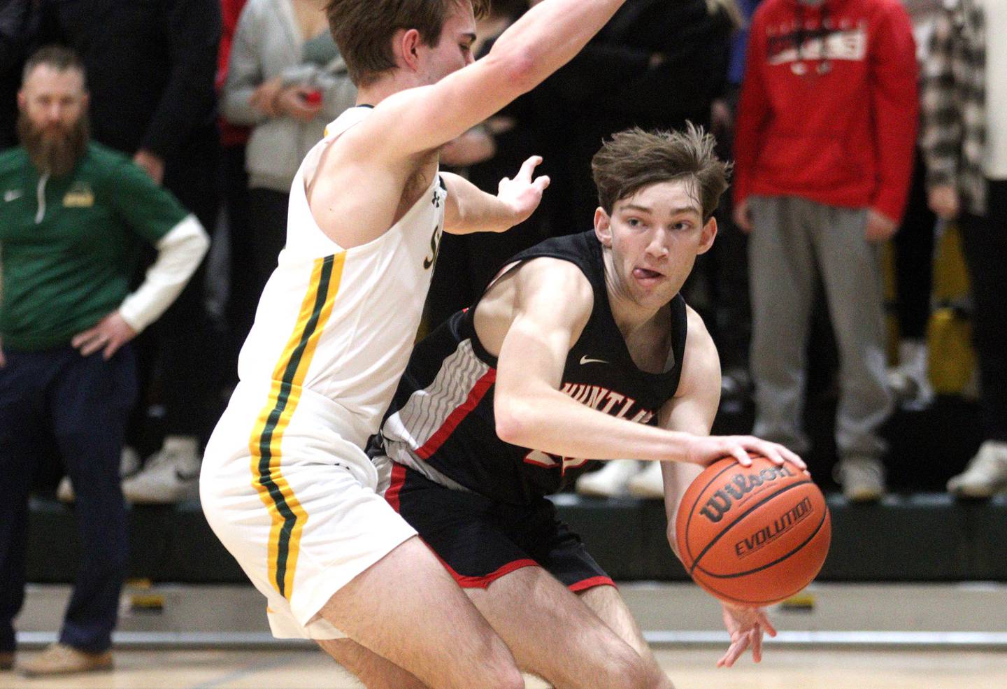 Huntley’s Ethan Blackmore looks for an option in varsity boys basketball at Crystal Lake South Friday night.