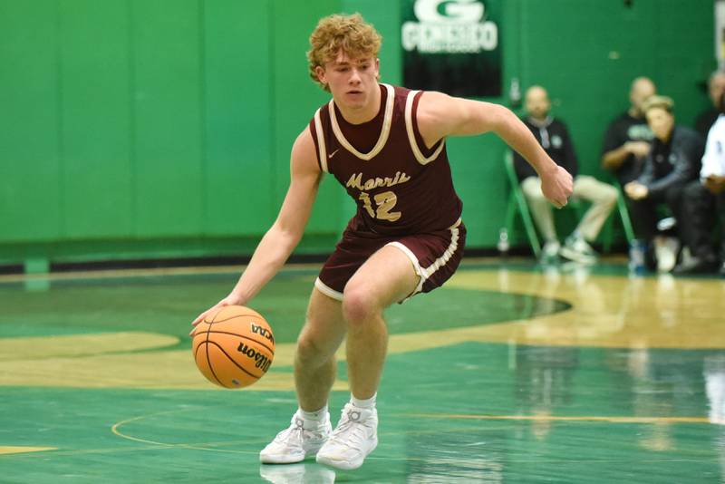 Morris' Caden Medler drives to the basket during the IHSA Class 3A Geneseo Regional semifinals against Kankakee Wednesday, Feb. 25, 2026.