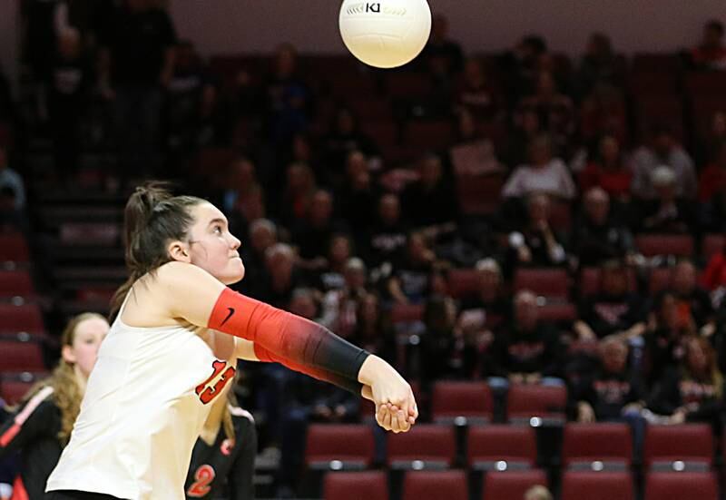 Barrington's libero Molly Kozak (13) returns a serve from Benet Academy in the Class 4A semifinal game on Friday, Nov. 11, 2022 at Redbird Arena in Normal.