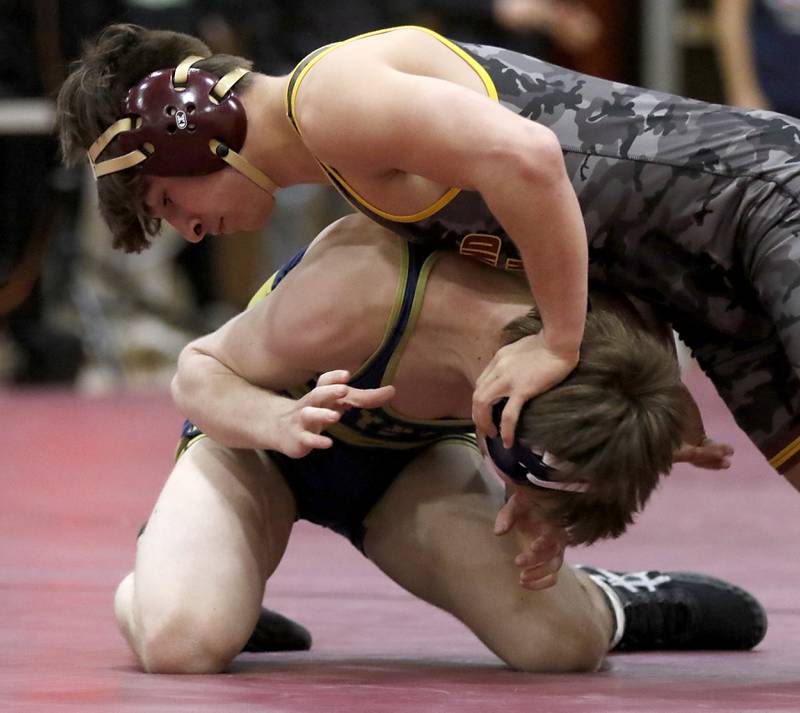Richmond-Burton’s Emmett Nelson controls Harvest Christian’s Max Mulhearn in the 144-pound championship match of the IHSA 1A Marengo Wrestling Regional on Saturday, Feb. 8, 2025, at Marengo High School.