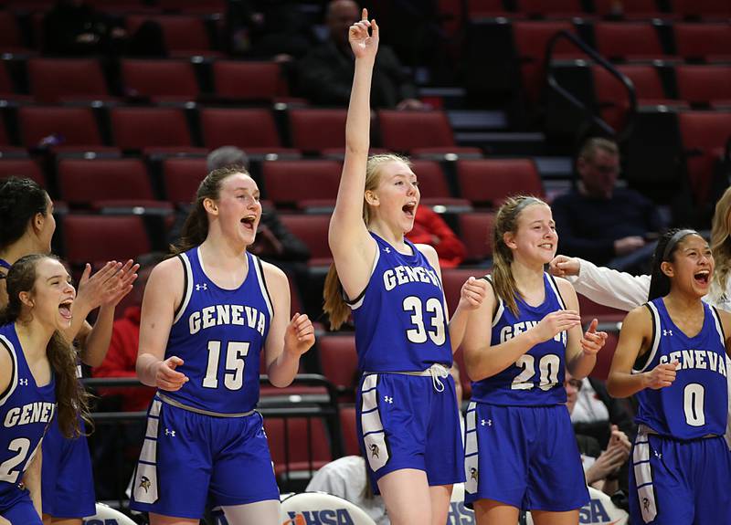 Members of the Geneva girls basketball team (from left) Kinzie Gracey, Cassidy Arni, Laruen Slagle, Caroline Madden and Rile Hasegawa cheer on their teammates from the bench in the final minute of the Class 4A third place game on Friday, March 3, 2023 at CEFCU Arena in Normal.