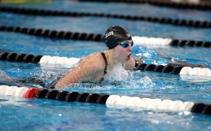 Rosary’s Elizabeth Nawrocki competes in the 100-yard breaststroke championship heat during the IHSA Girls State Swimming and Diving Championships at the FMC Natatorium in Westmont on Saturday, Nov. 11, 2023.