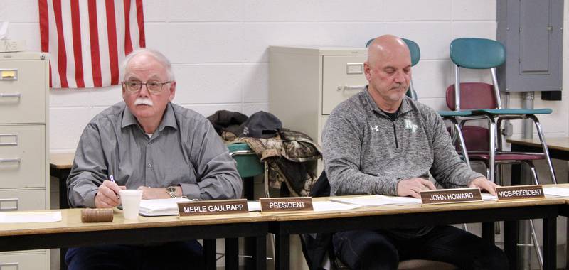 Board of Education President Merle Gaulrapp and Vice President John Howard attend a meeting Wednesday at Rock Falls High School.