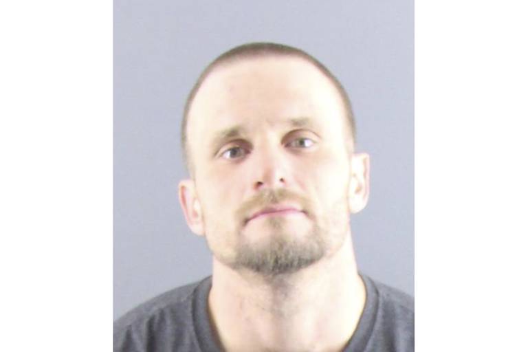 This book photo provided by the Peoria, Ill., Police Department shows Tyler Massengill, a central Illinois man charged Wednesday, Jan. 25, 2023, for allegedly setting fire to a Planned Parenthood clinic earlier this month, federal law enforcement said. Massengill, 32, of Chillicothe, Ill., is charged with “malicious use of fire and an explosive to damage, and attempt to damage” the Planned Parenthood building in Peoria, according to the U.S. Attorney’s Office.