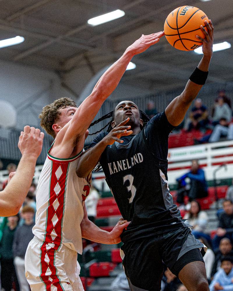 Kaneland's Marshawn Cocroft (3) lays up ball as LaSalle-Peru's Regan Doerr (2) attempts to contest shot on Friday, Feb. 20, 2026 in Sellett Gymnasium at L-P High School.