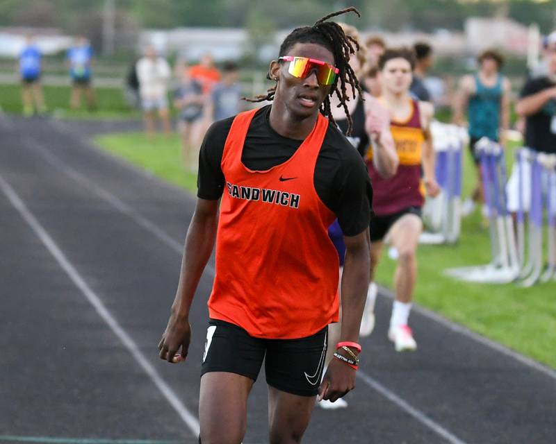 Simeion Harris competes in the 400 meter run on Tuesday May 7, 2024, during the Kishwaukee River Conference track meet held at Plano High School.