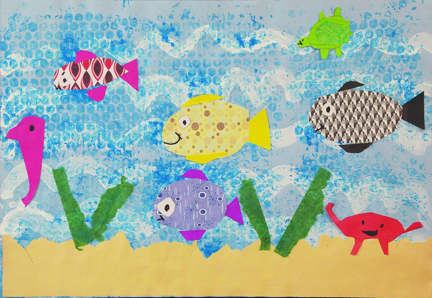 Jovie F., a first grader at Franklin Elementary, Sterling, won first place in the K-4 category with her mixed media piece called “Under the Sea.”