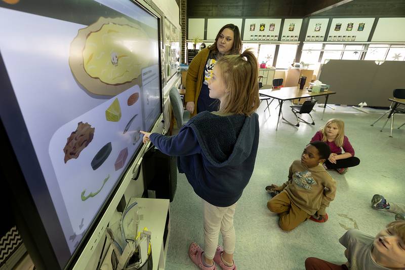 The smart board responds to touch to make learning more interactive as seen in Kara Jones’ Jefferson School class Friday, Feb. 7, 2025.