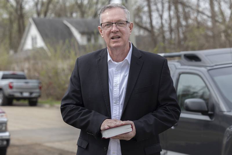 Oneighty Church pastor Paul Sheley blesses the home during the latest Dixon Habitat for Humanity house build Saturday, April 19, 2025. This is the 33rd home built by the organization.
