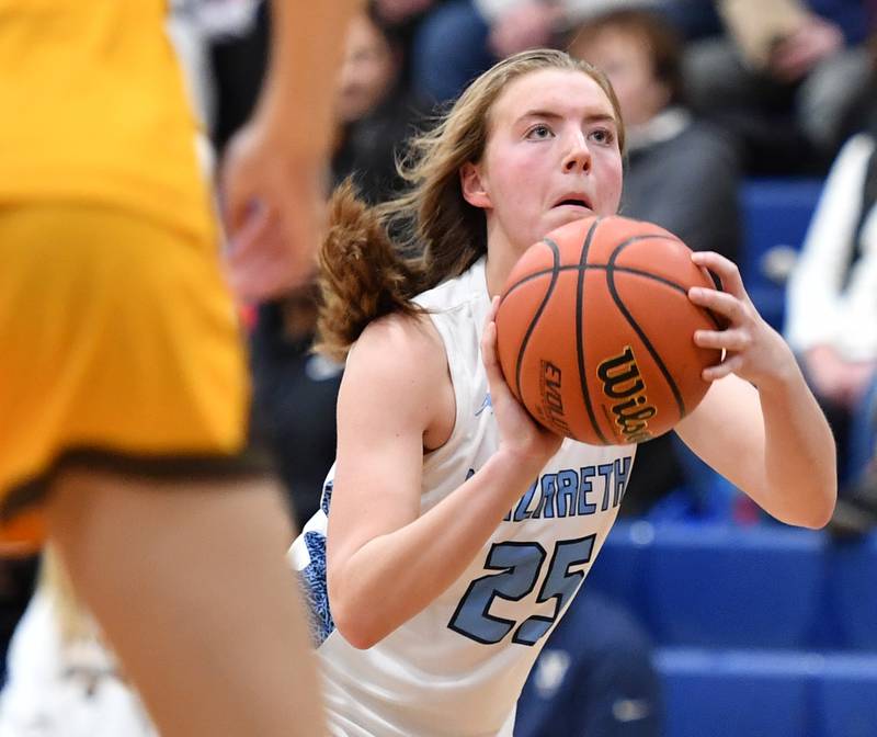 Nazareth's Amalia Dray takes aim at the basket during the ESCC conference tournament championship game against Carmel on Feb. 4, 2023 at Nazareth Academy in LaGrange Park.