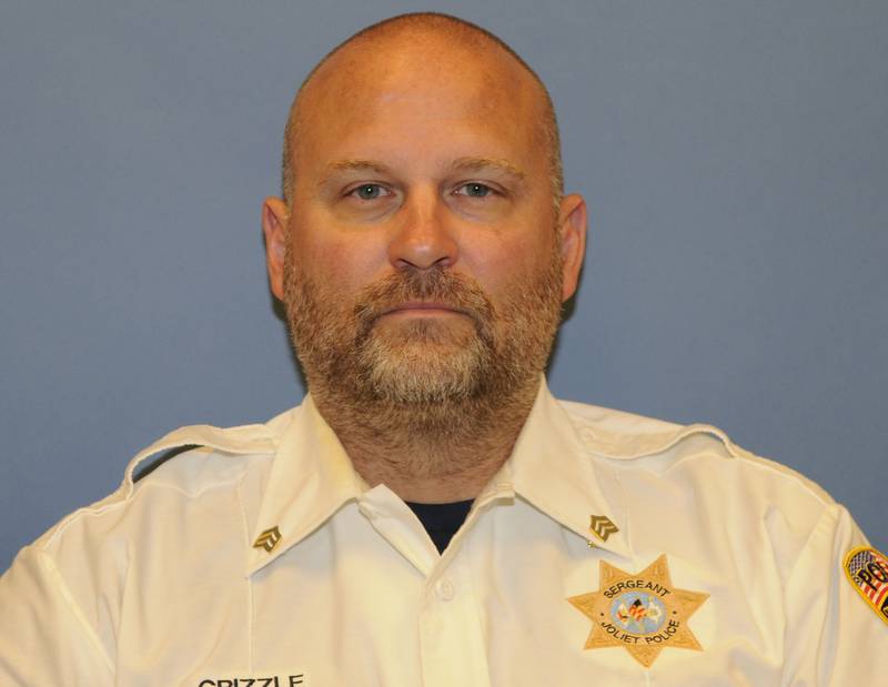 A 2022 employee photo of retired Joliet Police Sgt. Ed Grizzle.