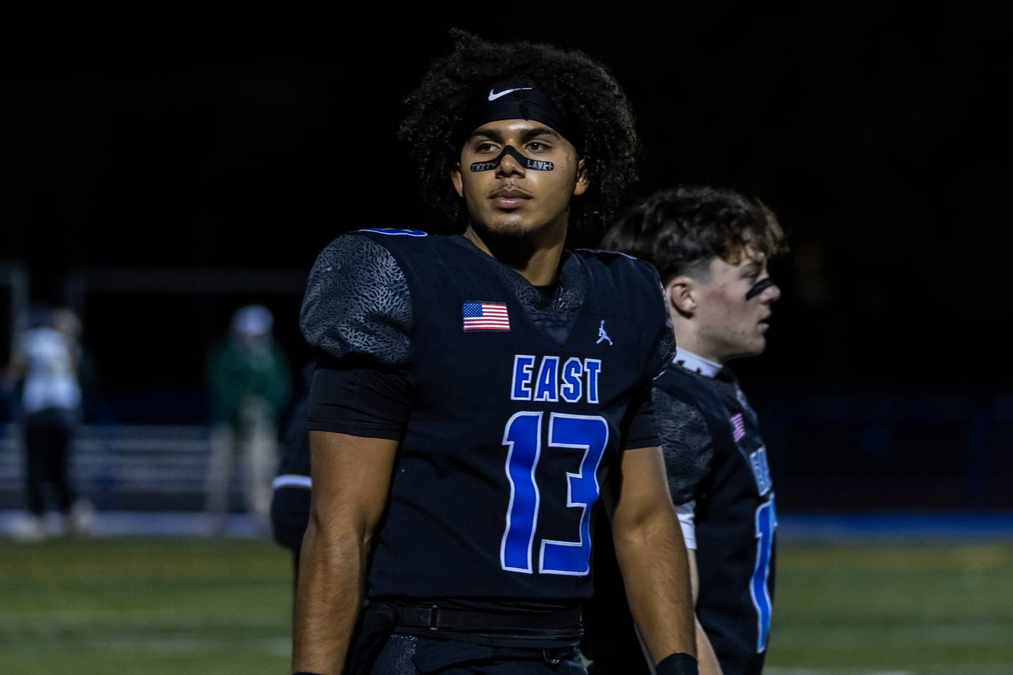 Lincoln-Way East's Jonas Williams looks out to the stands prior to a varsity football round one playoff game against Stevenson at Lincoln-Way East on Oct. 31, 2025.