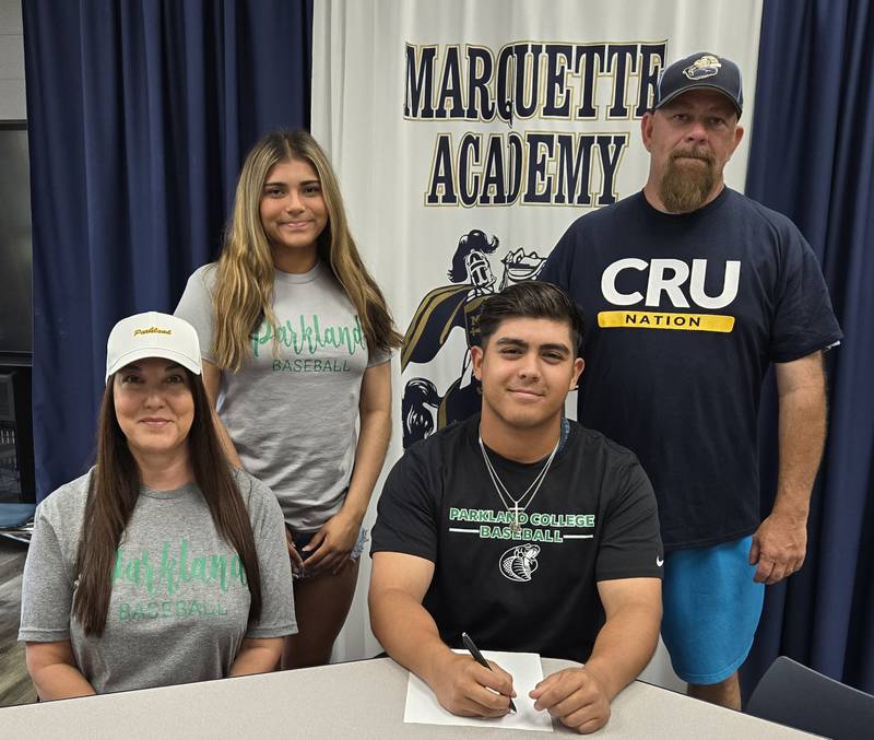Recent Marquette Academy graduate Sam Mitre has committed to continue his academic career at Parkland College in Champaign and his baseball career at the NJCAA level with the Cobras. Pictured here is Mitre sitting by his mother, Tonya, with sister, Senya, and Marquette baseball coach Todd Hopkins standing behind.