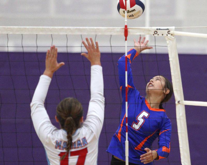 Genoa-Kingston’s Mia Wise sends the ball against Marian Central in varsity volleyball tournament action on Saturday, Sept. 21, 2024, at Hampshire High School in Hampshire.