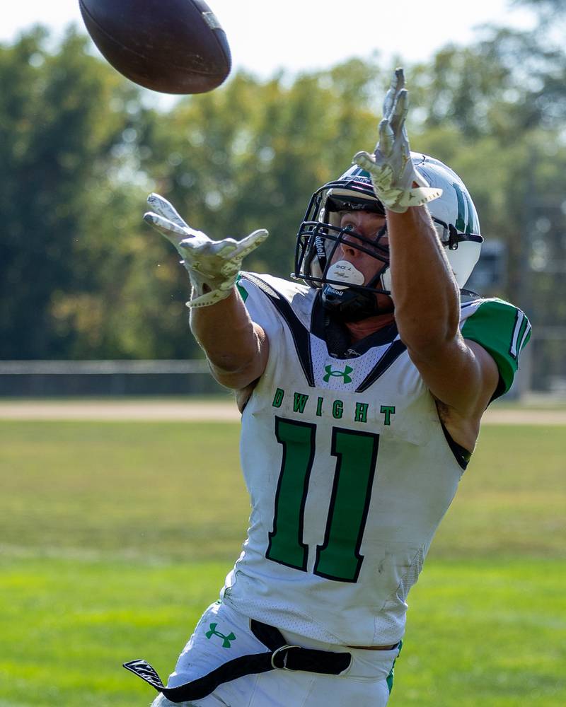 Joey Starks (11) of Dwight catches pass to covert touchdown in end zone on Saturday, Oct. 4, 2025 at Captain Thomas J. Heitmann field in Peru.