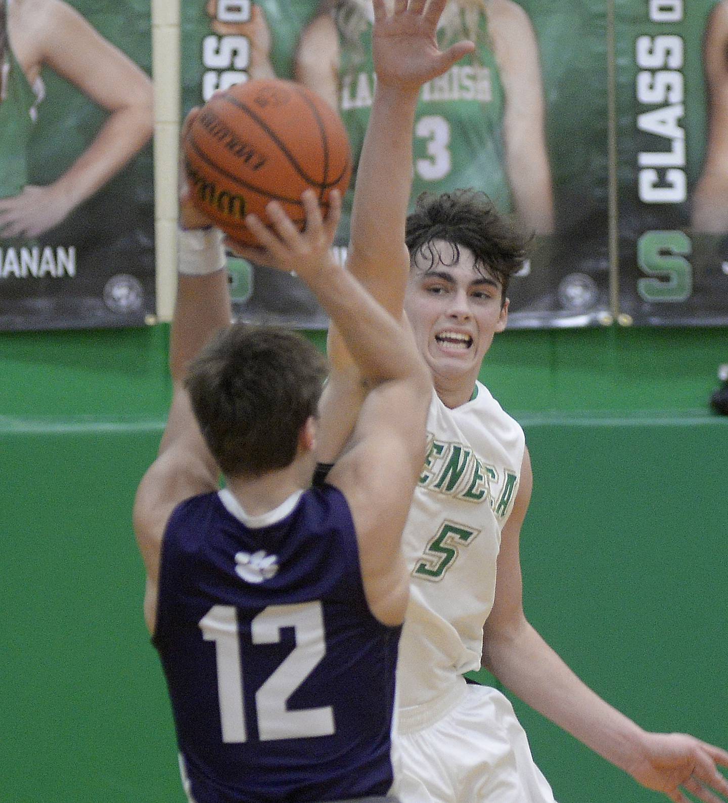 Seneca’s Kysen Klinker tries to block this shot by Wilmington’s Ryder Meents in the 4th period on Saturday, Feb. 4, 2023 at Seneca.