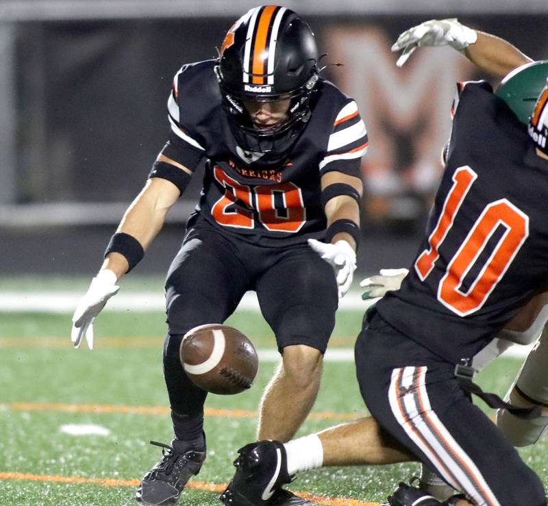 McHenry’s James Butler recovers a Crystal Lake South fumble in varsity boys football at McCracken Field on the campus of McHenry High School in McHenry on Friday, Sept. 5, 2025.