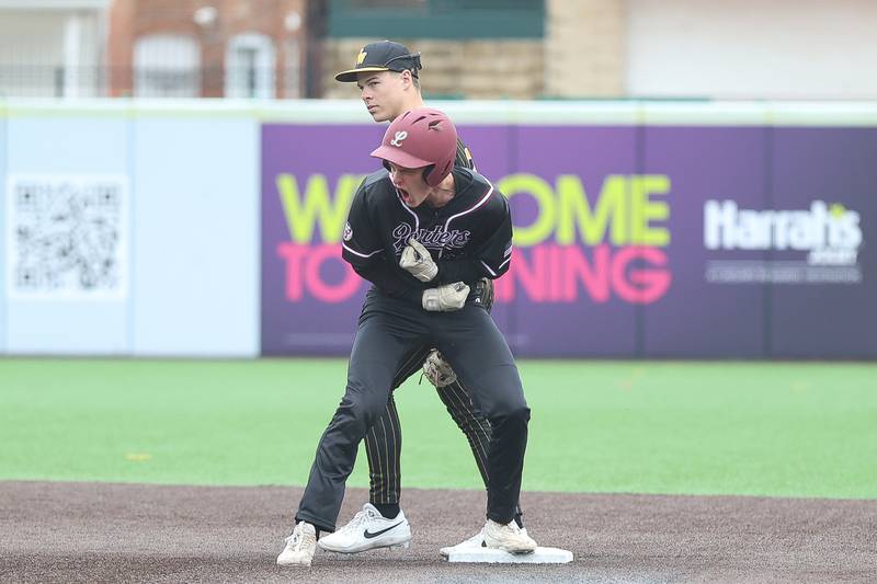 Lockport’s Jack Schiek celebrates a two run double to tie the game in the top of the 7th inning against Joliet West in the WJOL Don Ladas Memorial baseball tournament championship game on Saturday, April 4, 2026 in Joliet.