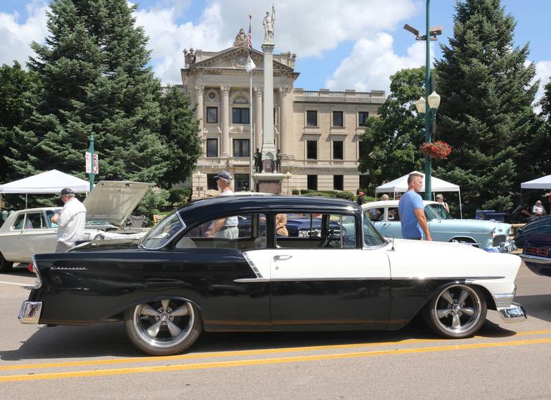 A 1956 Chevy 150 sits on State Street in front of the courthouse during the Fizz Ehrler Memorial Turning Back Time Car Show Sunday, July 30, 2023, in downtown Sycamore.
