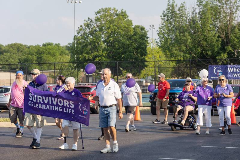 Cancer survivors make their way during the surviver lap during Relay for Life of Whiteside County’s event Saturday, June 3, 2023 at Westwood. 284 total years of survival were represented in the lap.
