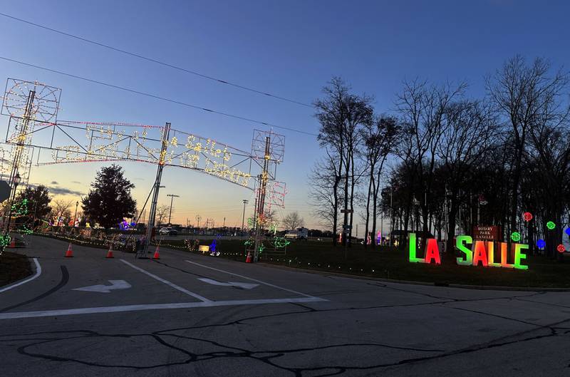 The sun sets over the Celebration of Lights display on Monday, Nov. 10, 2025 at Rotary Park in La Salle.