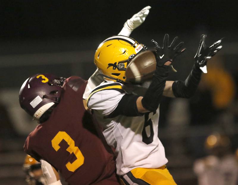 St. Laurence's Sean Rice breaks up a pass intended for Richmond-Burton's Oscar Bonilla during an IHSA Class 4A first-round football game on Friday, Nov. 1, 2024, at Richmond-Burton High School in Richmond.