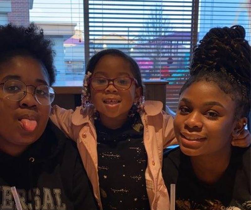 Dykota Morgan, 15, of Bolingbrook was an athlete, artist, activist and scholar. She died of complications from COVID-19 on May 4. Dykota (right) is pictured with her older sister Dyman (left) and younger sister Layla.