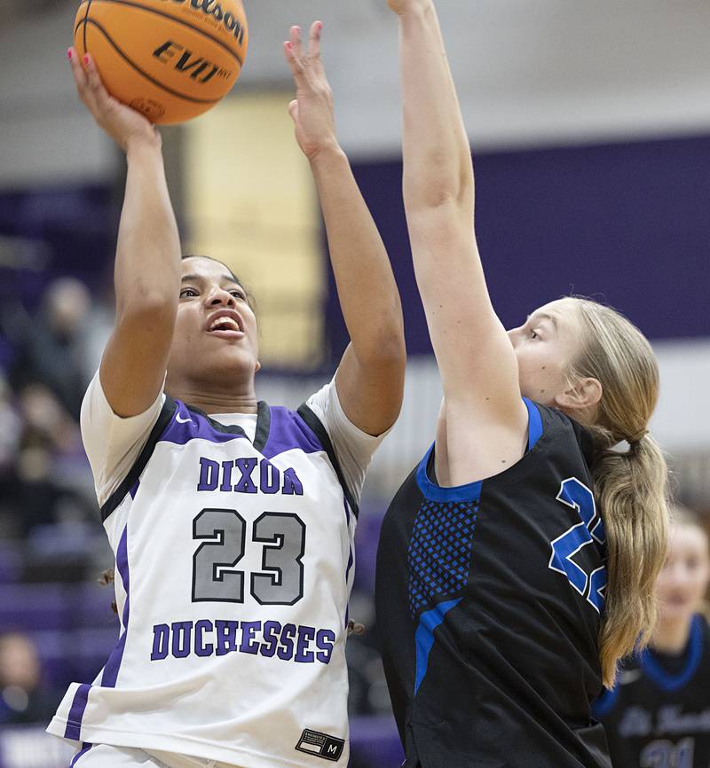 Dixon’s Ahmyrie McGowan puts up a shot against St. Francis’ Tenley Glock Saturday, Jan. 10, 2026.