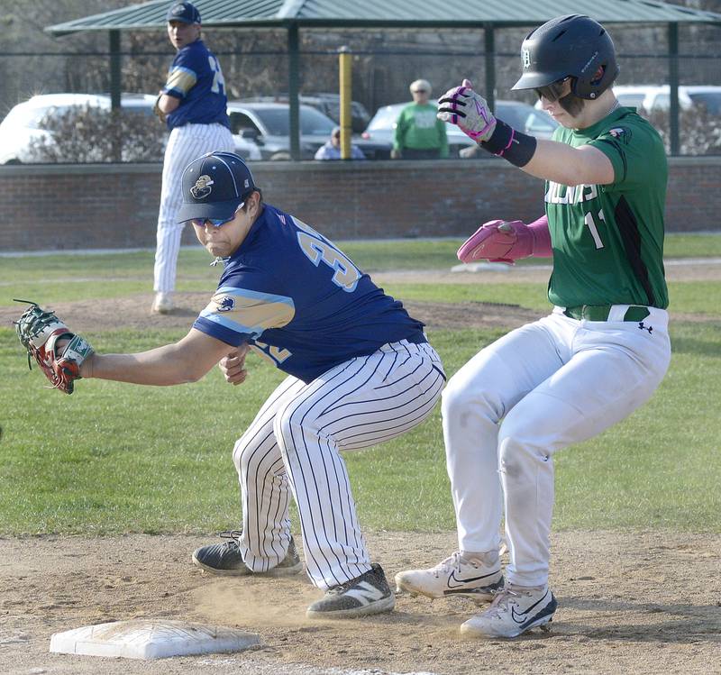 Marquette’s Sam Mitre prepares a tag on Dwight’s Ryan Bumpous at 1st base on a pickoff attempt Thursday at Masinelli Field in Ottawa.
