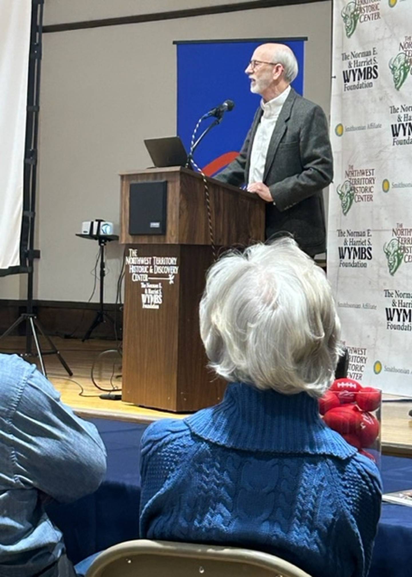 Historian Tom Wadsworth speaks to the crowd that gathered to celebrate President Ronald Reagan's birthday Tuesday night at the Northwest Territory Historic Center in Dixon.