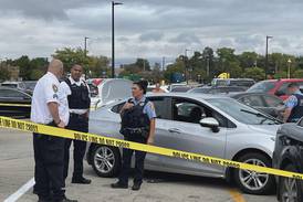 Woman struck, pinned by vehicle outside Joliet Walmart