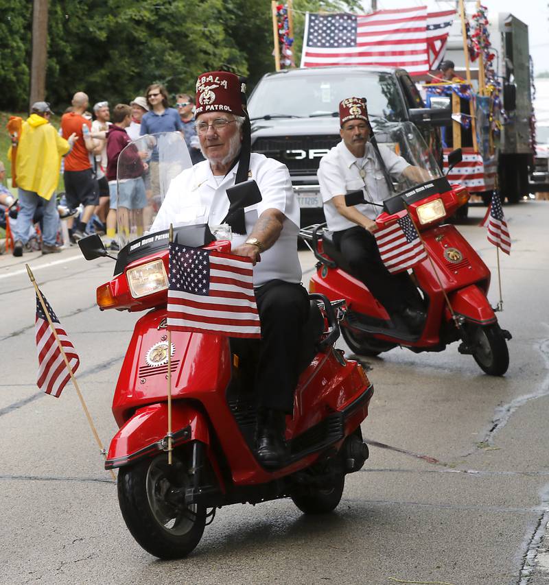 Members of the Tebala Motor Patrol perform Sunday, July 2, 2023 during Crystal Lake’s annual Independence Day Parade on Dole Avenue in Crystal Lake. This year’s parade feature close to 100 units.