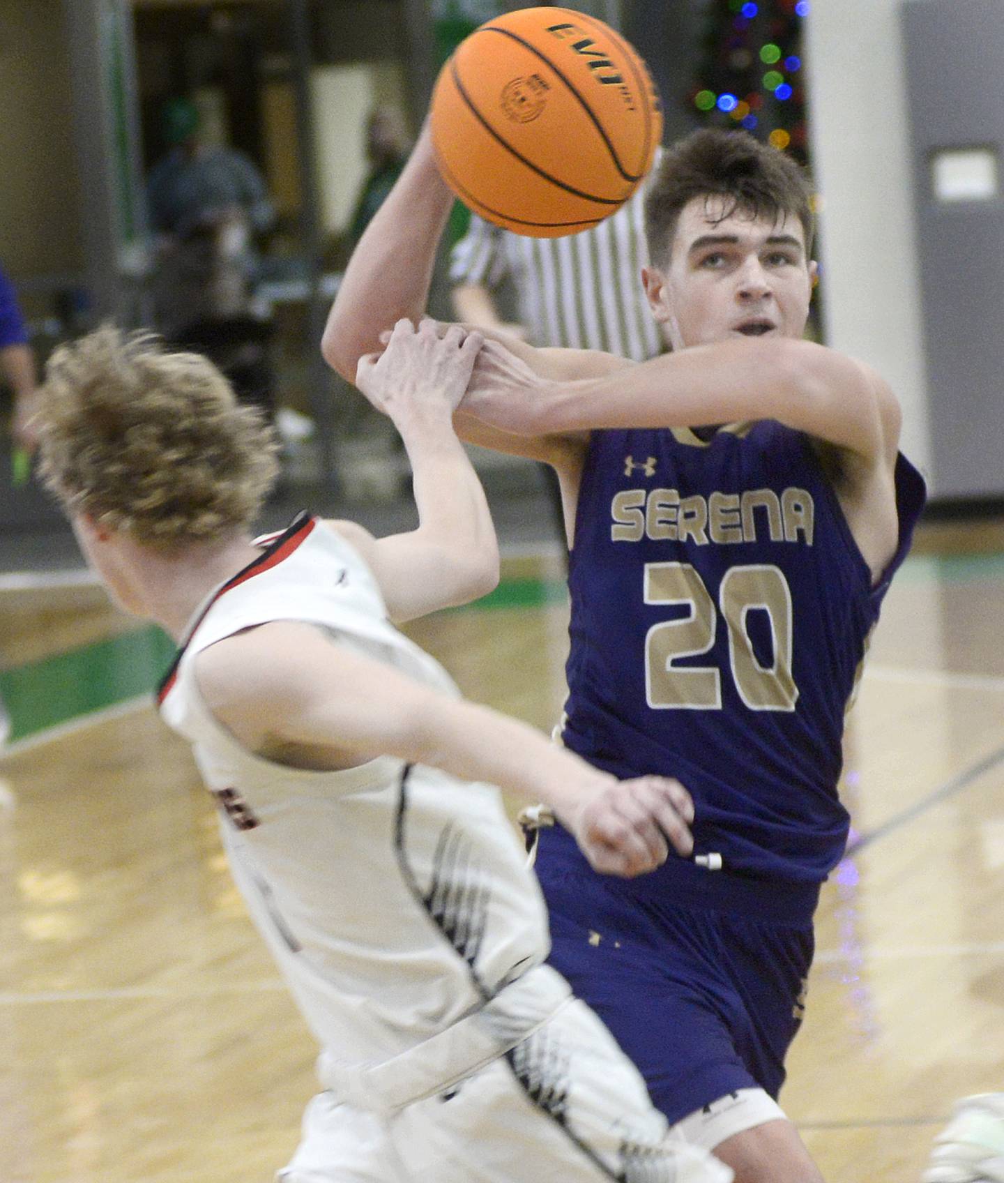 Woodland’s Connor Dodge attempt to block a pass by Serena’s Beau Raikes in a game during the Seneca Shipyard Showdown Tournament earlier this season.