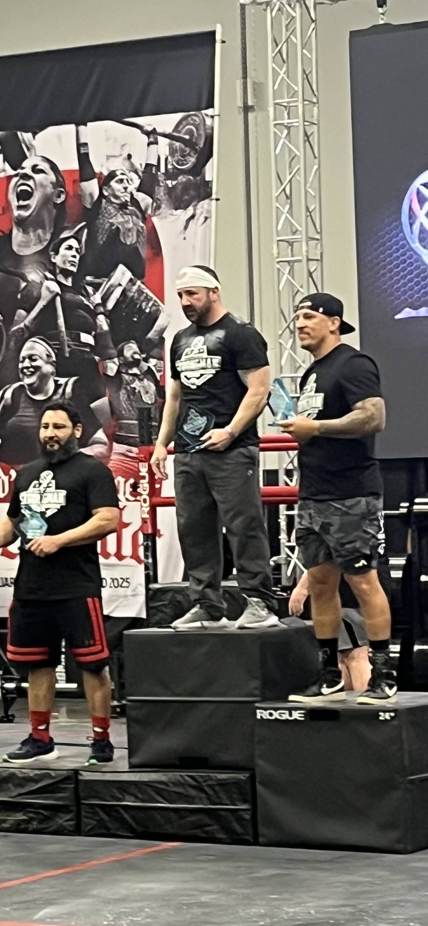 Crystal Lake native Quint Zambon stands on the podium after winning the Arnold Master's Strongman Championship in the men's age 40-plus 198-pound weight class March 2, 2025, in Columbus, Ohio.