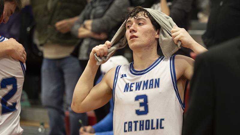 Newman’s Garret Matznick reacts to the Comets’ season ending 70-66 to Pecatonica in OT Tuesday, March 3, 2026, in the 1A sectional semifinal.