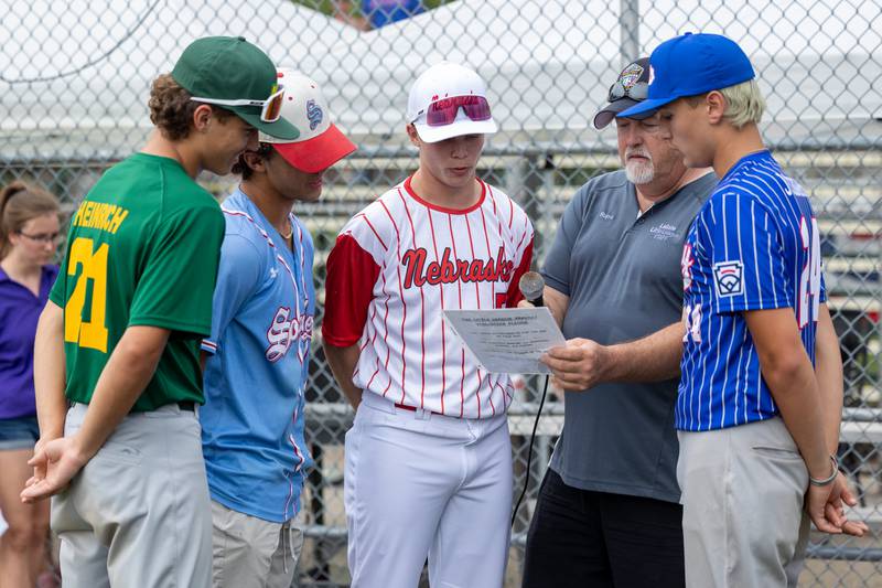 (left to right) Carter Heinrich, Jansen Fahlen, Bradyn Sinsel, Rob Ruppert and Jax Schnarr announce the player expectations at the Central Region Tournament, opening Ceremony on Friday, July 11, 2025 at Washington Park in Peru.