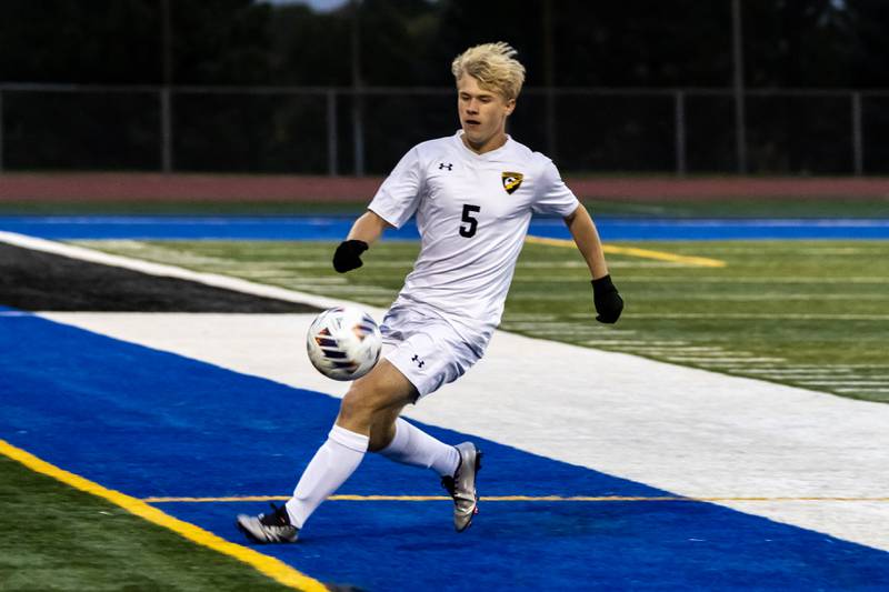 Andrew's Alex Kreydich fights to keep the ball inbounds during the 3A L-W East Regional boys varsity soccer match against Joliet West at Lincoln-Way East on Oct. 21, 2025.