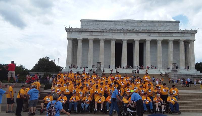 Members of the Lee County Honor Flight gather on the steps of the Lincoln Memorial during their visit to Washington D.C. in September.