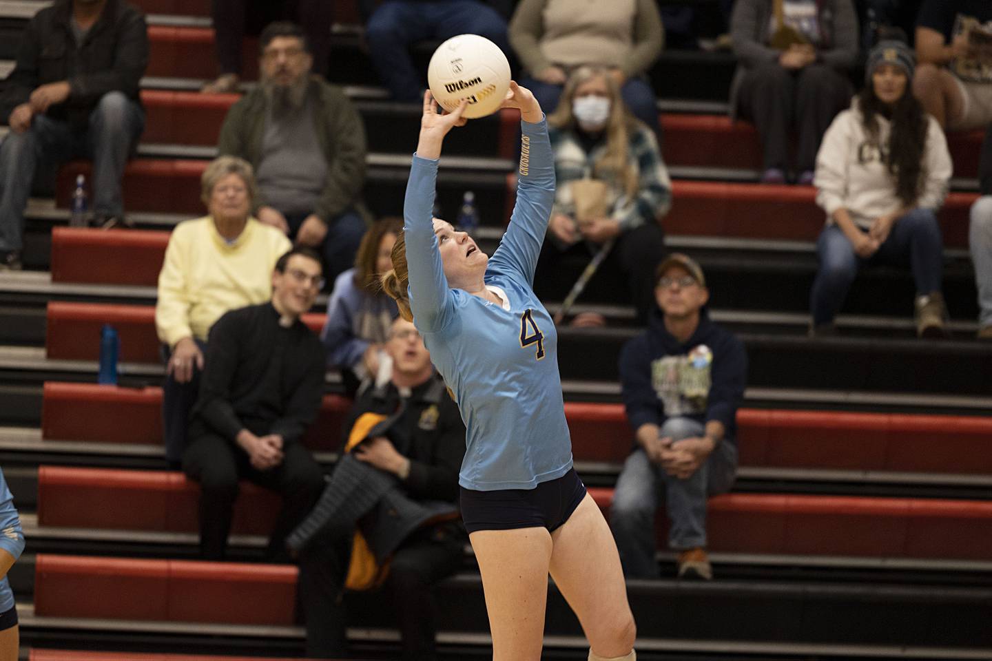 Ottawa Marquette’s Kaylee Killelea sets the ball in game one of the Crusader’s sectional semifinal Monday, Oct. 31, 2022 against River Ridge.