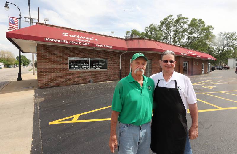 Greg (left) and Earl Sullivan, who own Sullivan's Tavern with brother Albert and sister-in-law Cindy, (not pictured) outside the location Thursday, May 15, 2025, at the tavern in DeKalb. The bar is celebrating 80 years in business with an event Saturday, May 17, that will include food and live entertainment.