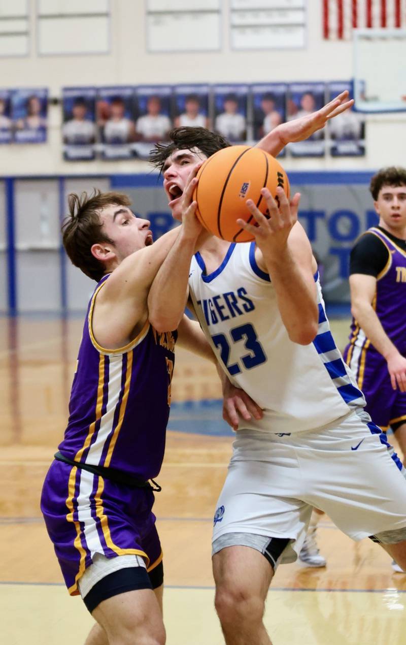 Princeton's Noah LaPorte drives in Wednesday's regional semifinal game against Mendota at Prouty Gym. The Tigers won 54-47.