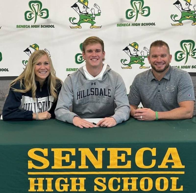 Seneca senior Paxton Giertz has signed to join the men's basketball team at Hillsdale College, a NCAA Division II school in Hillsdale, Michigan. He was joined by his parents (front row) Jenni and Mark Giertz.