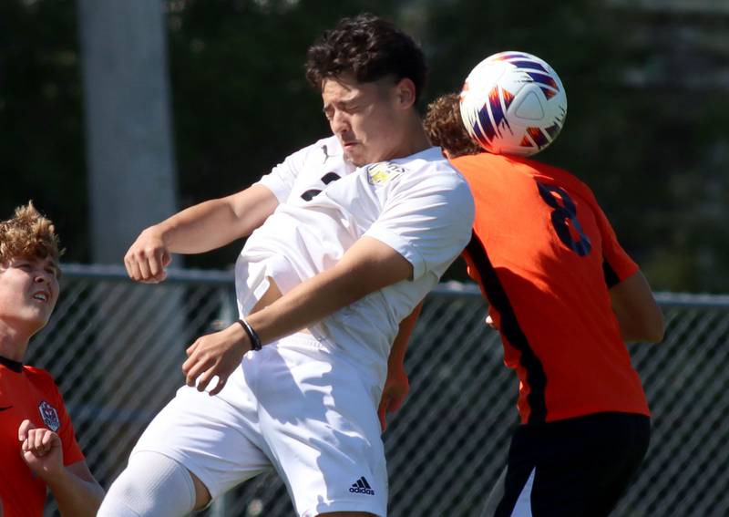 Harvard’s Jonathan Roldan, left, battles Crystal Lake Central’s Nick Pagonis for the ball in varsity boys soccer at Crystal Lake Central High School in Crystal Lake on Saturday, Sept. 6, 2025.