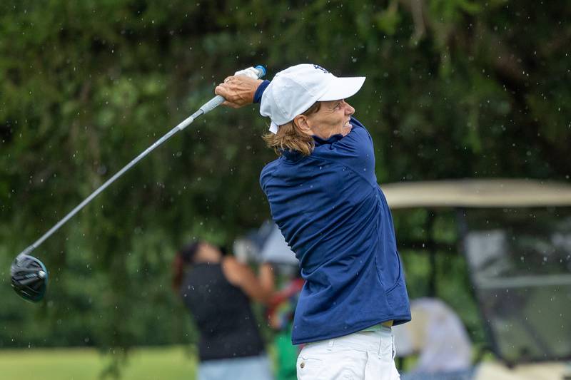 Julie Schmitt of Deer Park follows through on drive on Saturday, August 10, 2025 at the annual Illinois Valley Women's Golf Tournament at Edgewood Golf Club in McNabb.